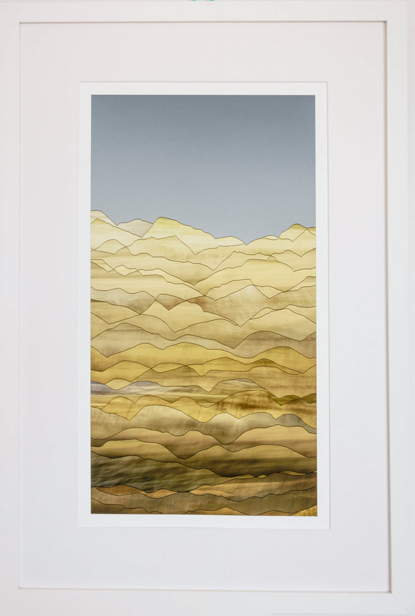 Framed artwork of a stylized landscape with wavy patterns in yellow and brown on a white background.
