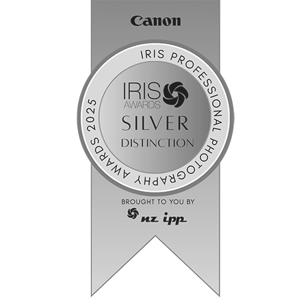 Silver award ribbon with 'Canon' and 'Iris Professional Photography Awards' text on a white background