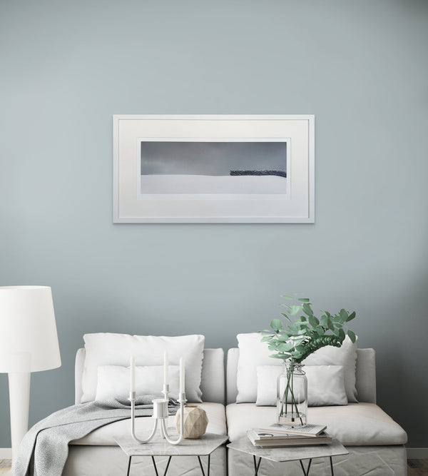 Framed print in a room setting