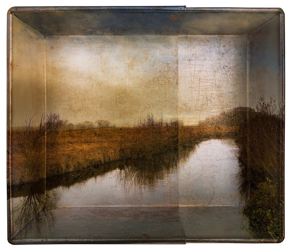 A Quiet River and an Old Cake Tin