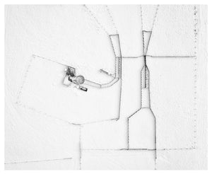 Aerial fine art photograph in black and white of fences in the  snow 