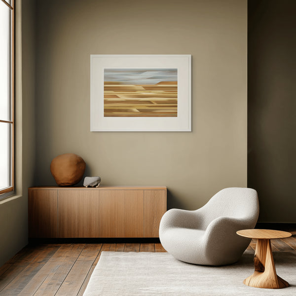 Modern interior with a white armchair, wooden side table, and abstract painting on a beige wall.